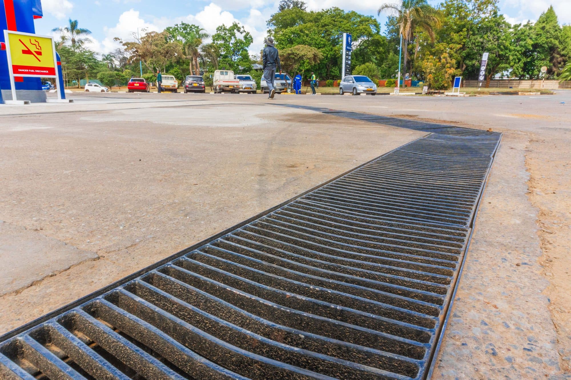 Forecourt drainage channel set into the slab
