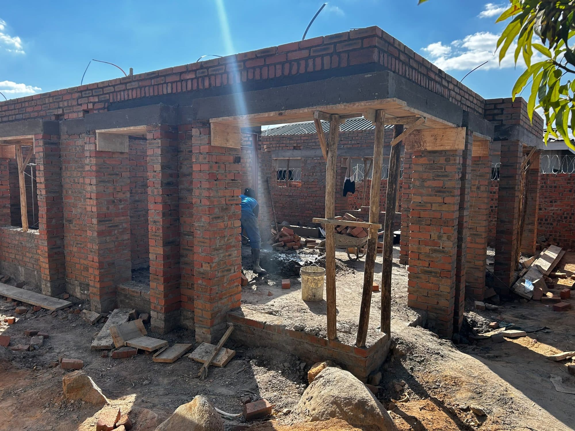 Brick walls rising to lintel height