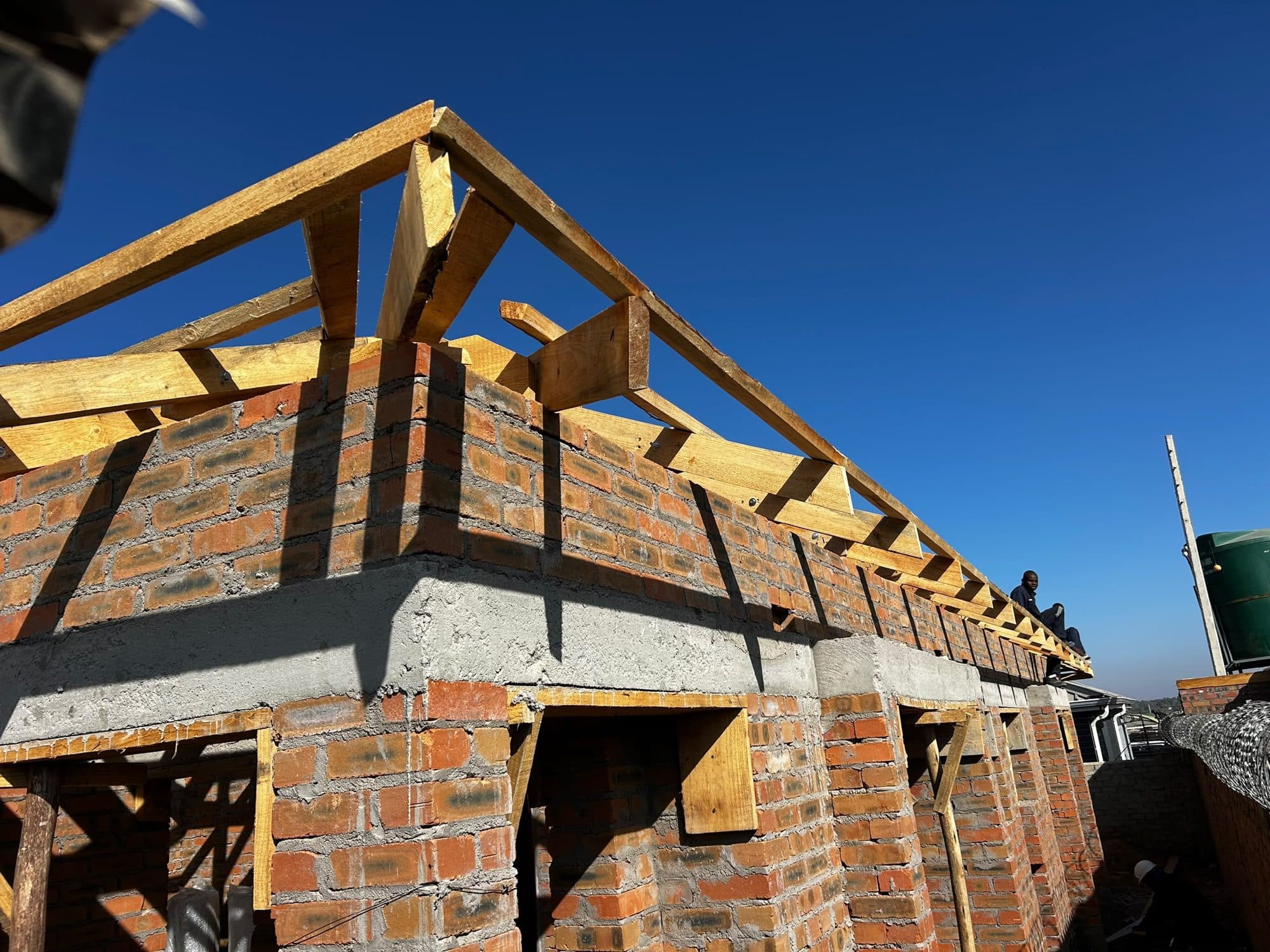 Roof trusses fixed over the completed walls