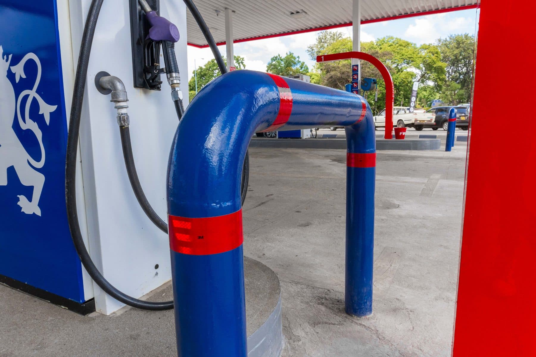 Freshly painted dispenser housing and pipework on a Redan forecourt