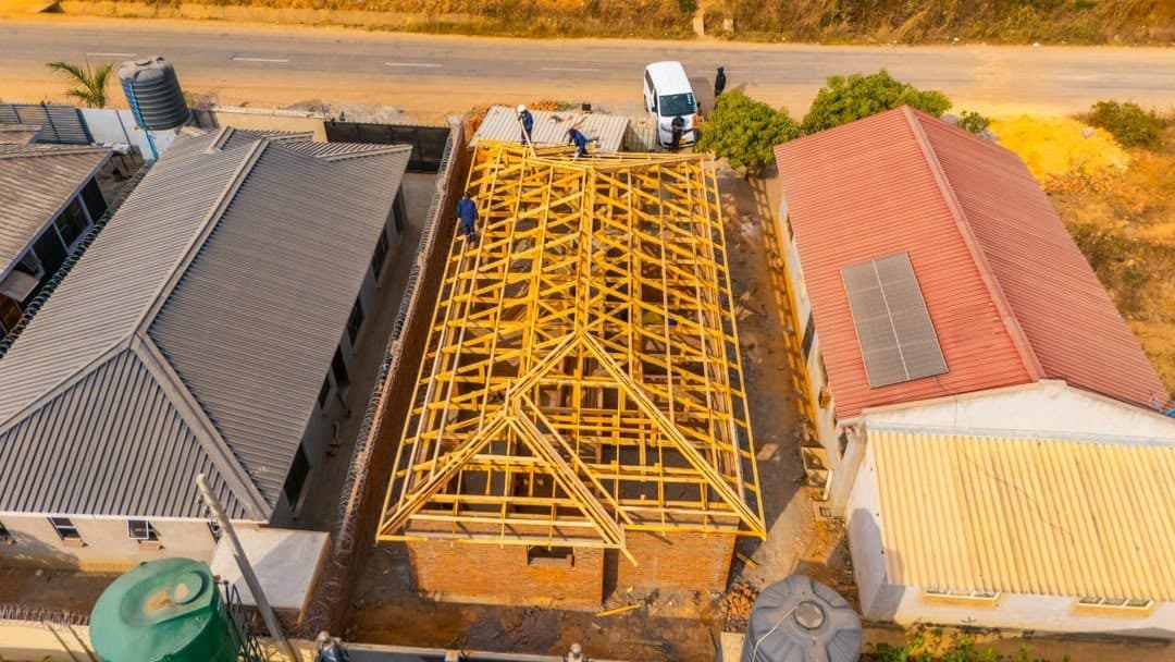 Aerial view of a roof structure being installed
